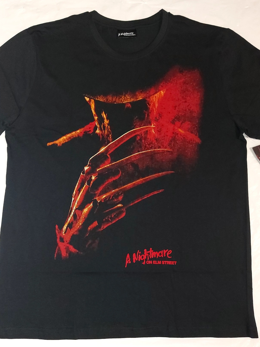 Warner Bros. A Nightmare on Elm Street Black T‑Shirt with Red Graphic